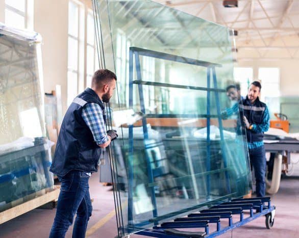 Glass Custom Size on Wheels Being Installed Two Men